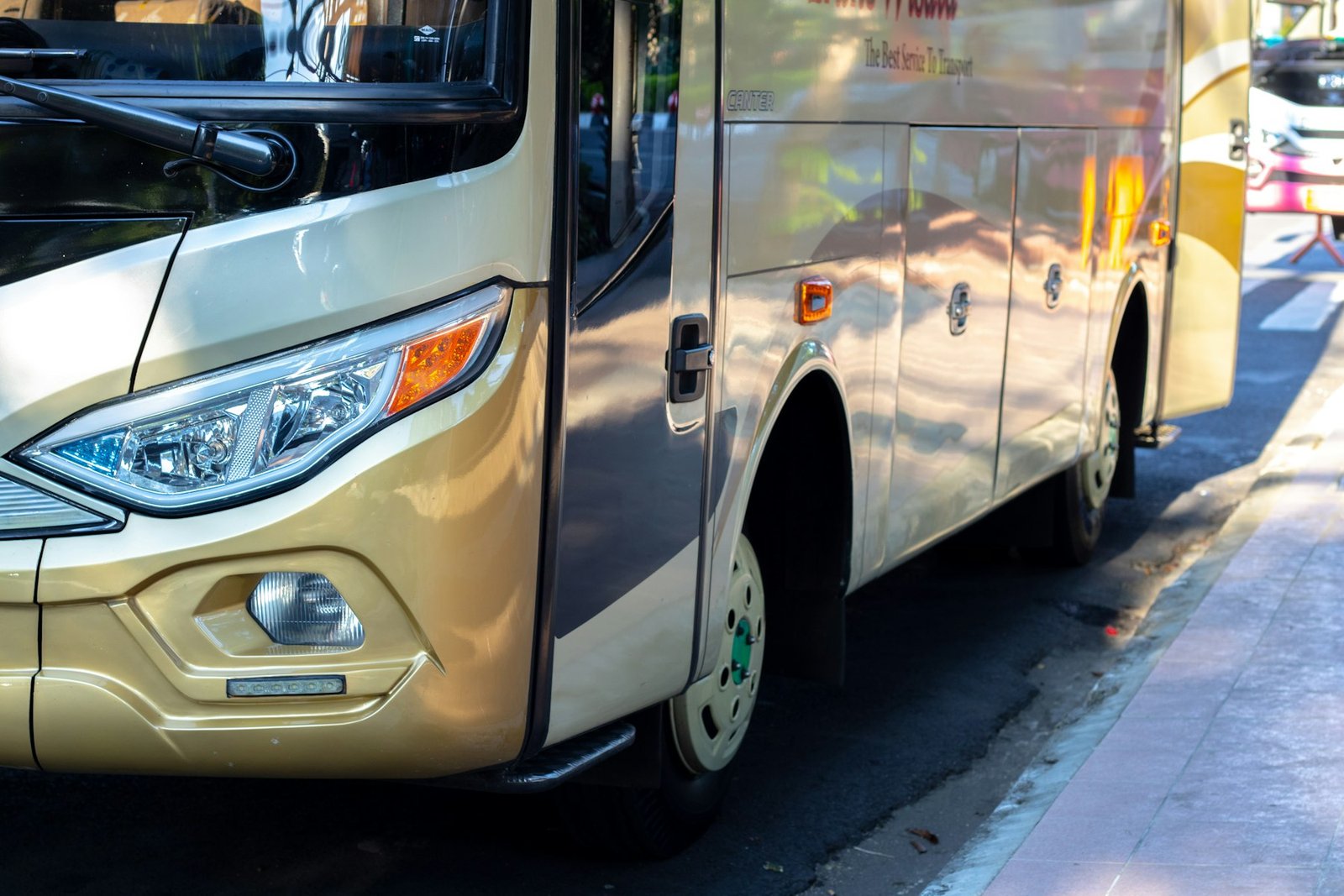 Sample photo of a passenger coach. Replace with your own vehicle.